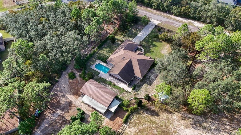 4295 North Bridge Road Beverly Hills, FL 34465 - Photo 54 of 79 an aerial view of a house with outdoor space
