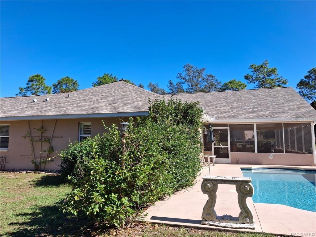 4295 North Bridge Road Beverly Hills, FL 34465 - Photo 63 of 79 front view of a house with a yard