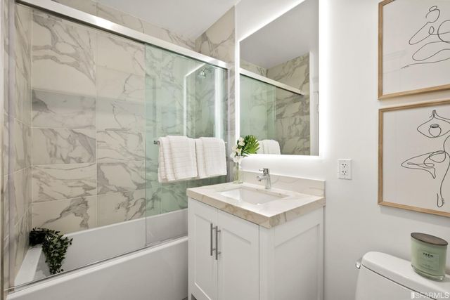 a bathroom with a sink and a bathtub