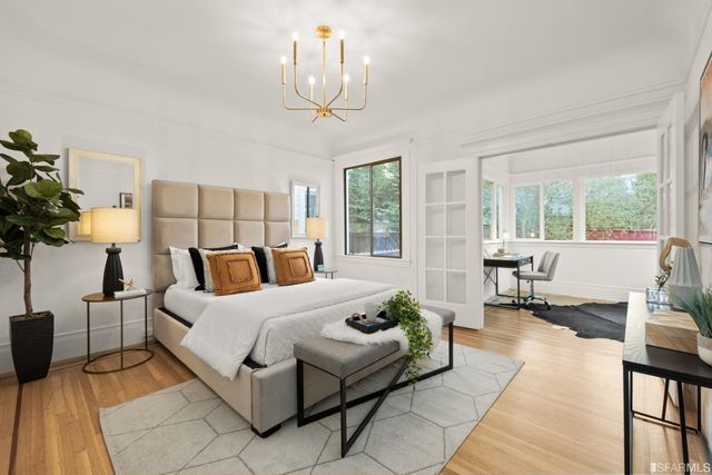 a view of a lobby with furniture and floor to ceiling window