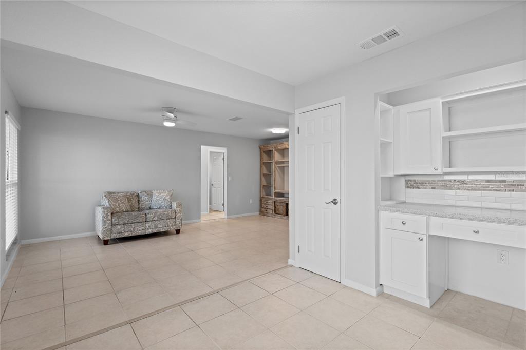 3801 42nd Street West Bradenton, FL 34205 - Photo 10 of 34 a living room with furniture and a rug