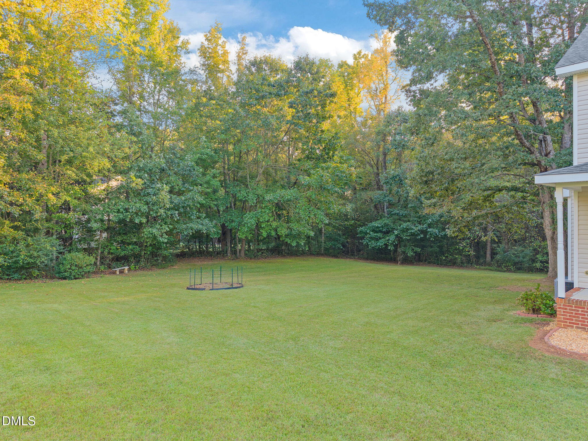 505 Vinson Road Clayton, NC 27527 - Photo 2 of 31 a view of a yard with a tree