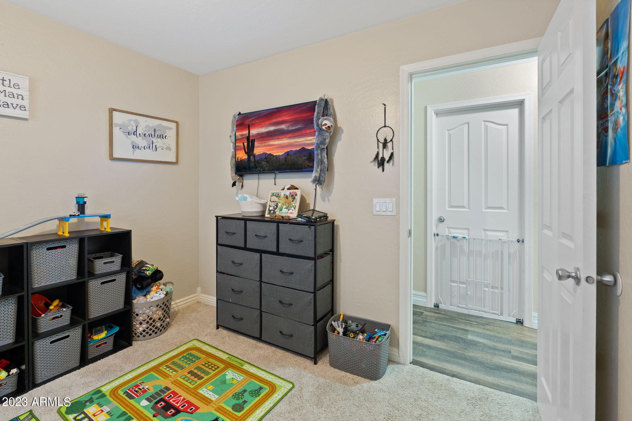 12537 West Bloomfield Road El Mirage, AZ 85335 - Photo 16 of 24 a room with toys and a dresser