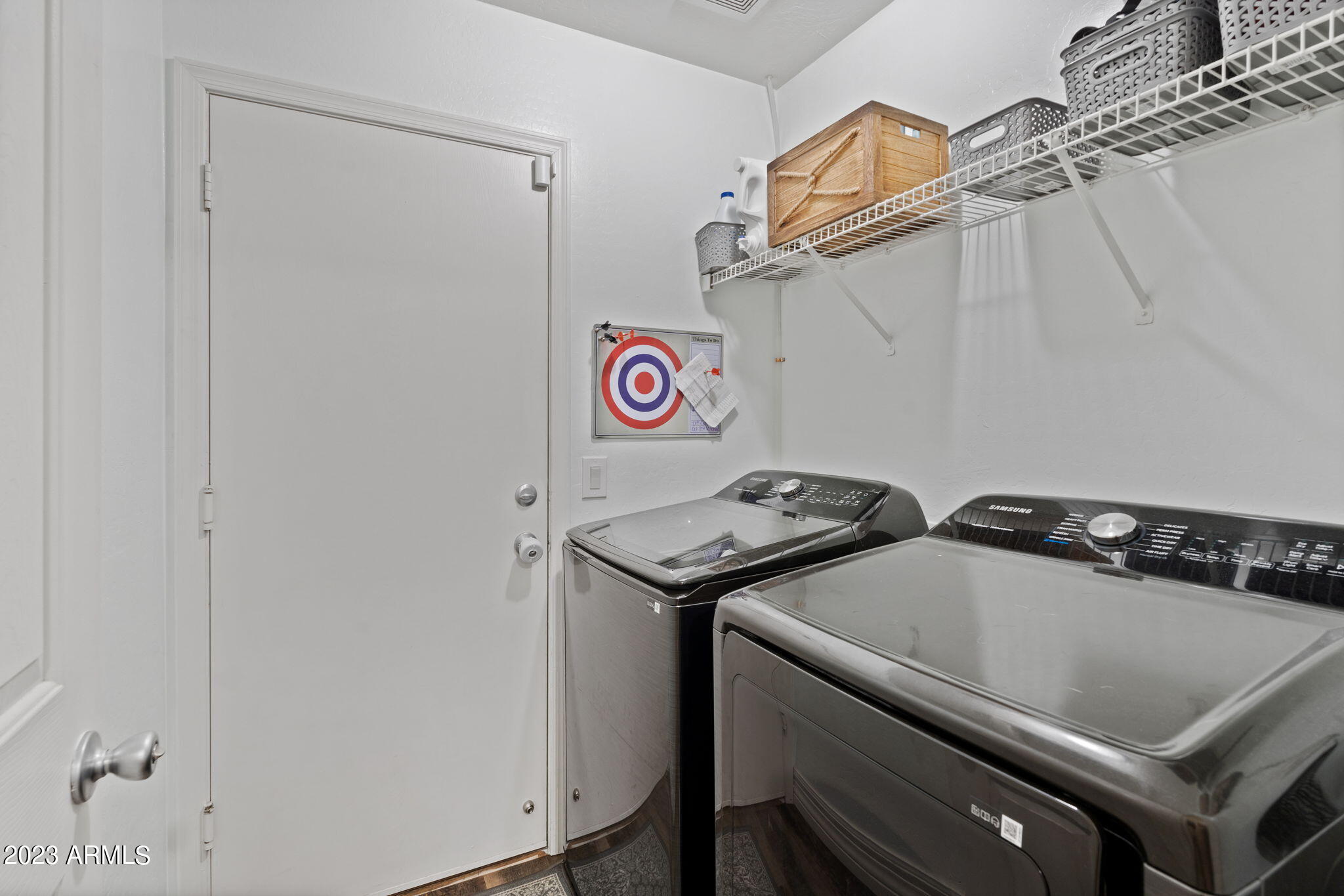 12537 West Bloomfield Road El Mirage, AZ 85335 - Photo 19 of 24 a utility room with dryer and washer
