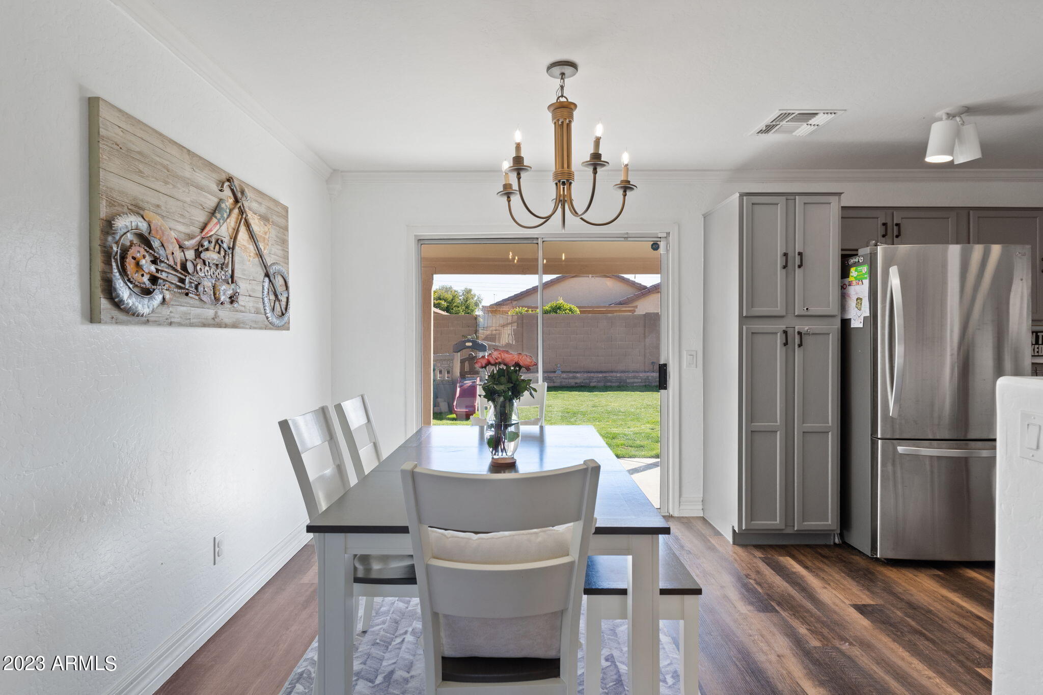 12537 West Bloomfield Road El Mirage, AZ 85335 - Photo 9 of 24 a dining room with furniture and window