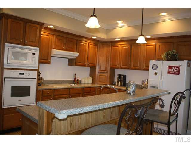 925 Quarterhorse Road Princeton, NC 27569 - Photo 10 of 21 ISLAND KITCHEN WITH COOK TOP AND WALL OVEN*BREAKFAST BAR & BREAKFAST ROOM*