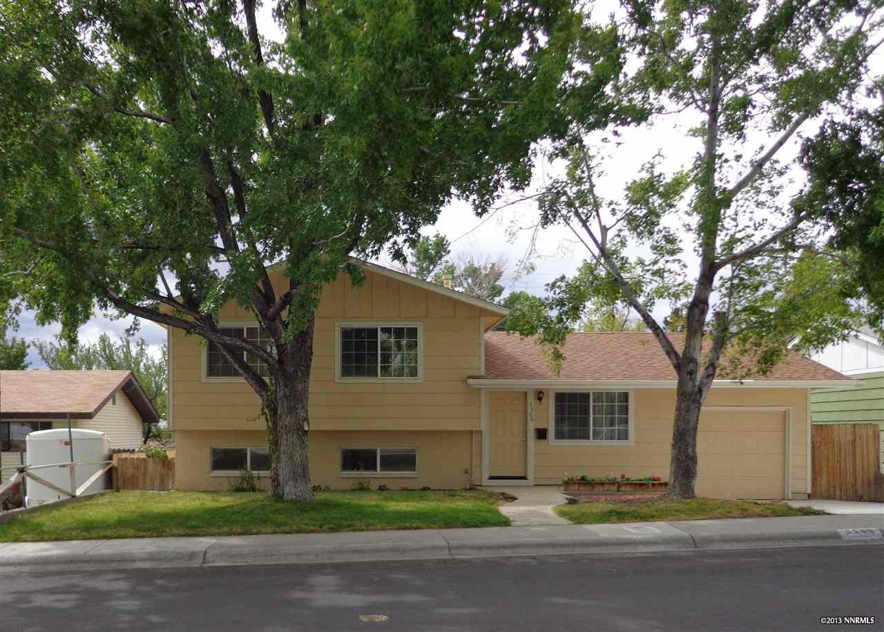 3500 Downey Avenue Reno, NV 89503 - Photo 1 of 1 a front view of a house with a yard and garage
