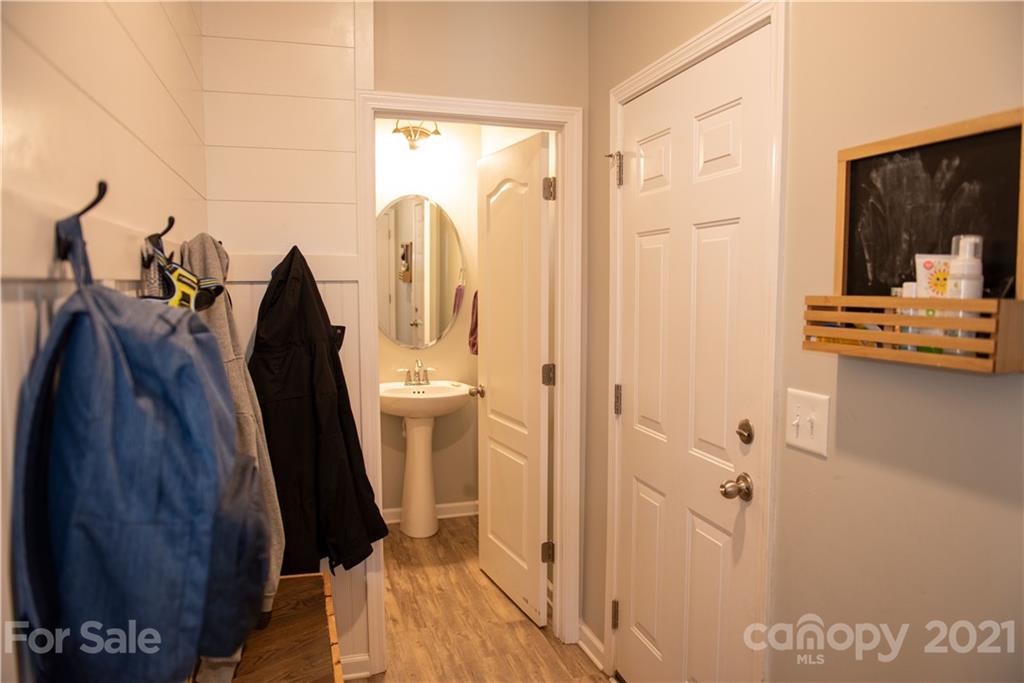 423 Triple Branch Trail Fort Mill, SC 29715 - Photo 12 of 29 a view of walk in closet with clothes and shoes