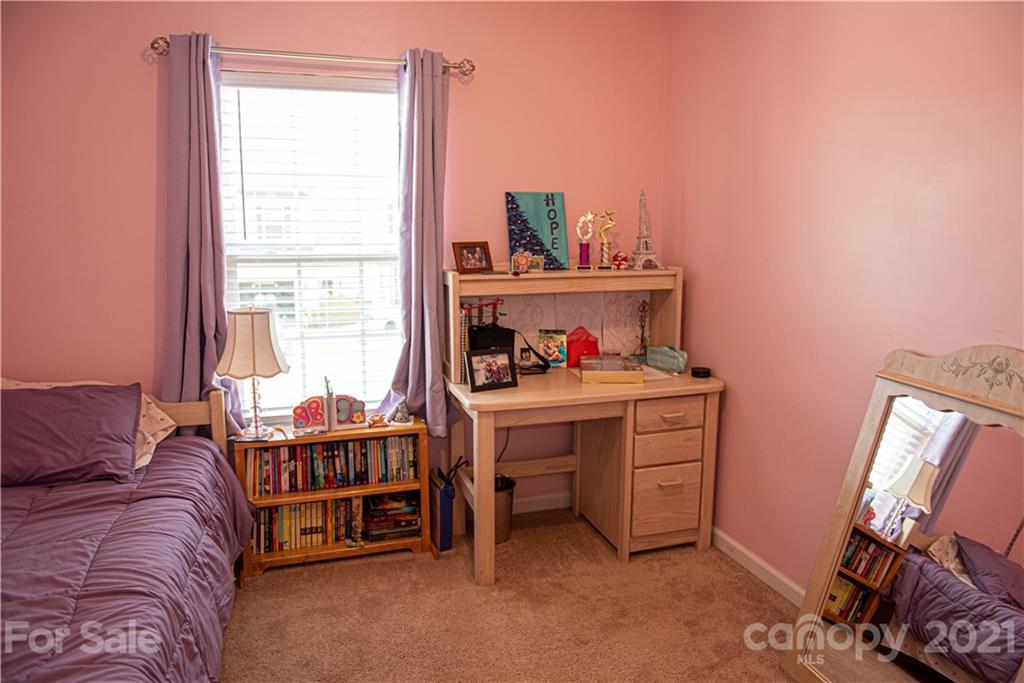 423 Triple Branch Trail Fort Mill, SC 29715 - Photo 24 of 29 a living room with furniture and a window
