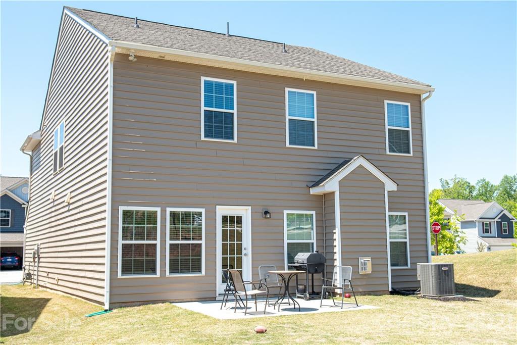 423 Triple Branch Trail Fort Mill, SC 29715 - Photo 27 of 29 a front view of a house with a yard