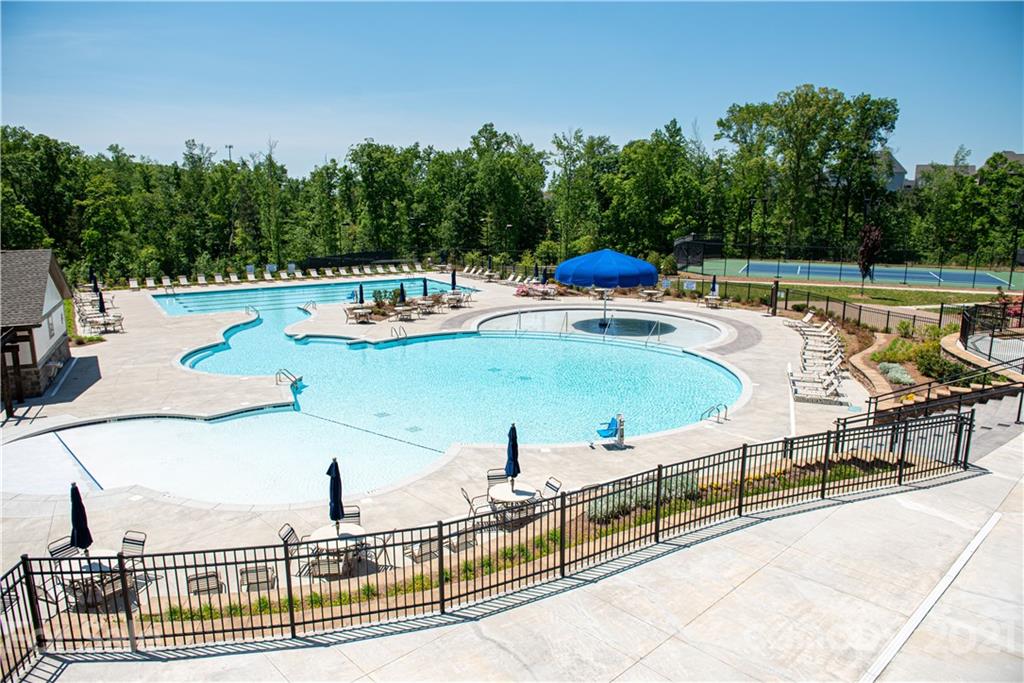 423 Triple Branch Trail Fort Mill, SC 29715 - Photo 29 of 29 a view of a swimming pool with a lounge chair