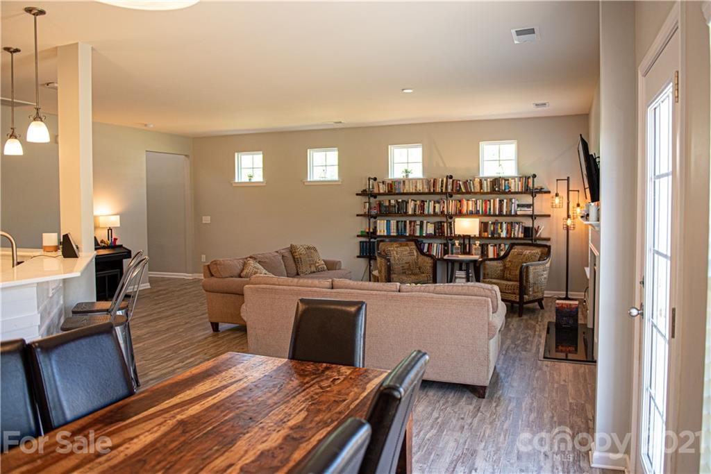 423 Triple Branch Trail Fort Mill, SC 29715 - Photo 6 of 29 a very nice looking living room with a couch and wooden floor