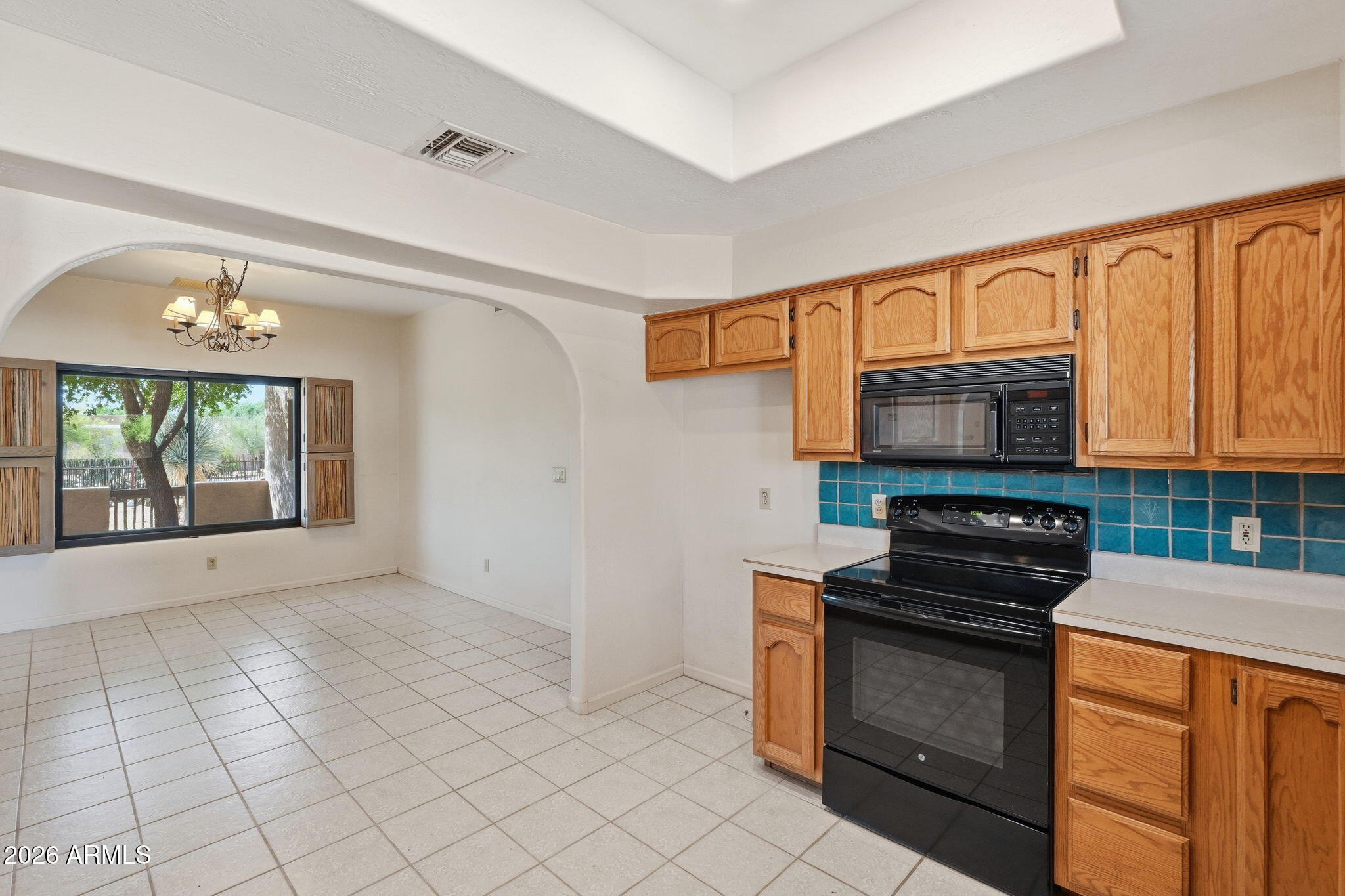 2630 West Irvine Road Phoenix, AZ 85086 - Photo 15 of 37 Kitchen into Dining