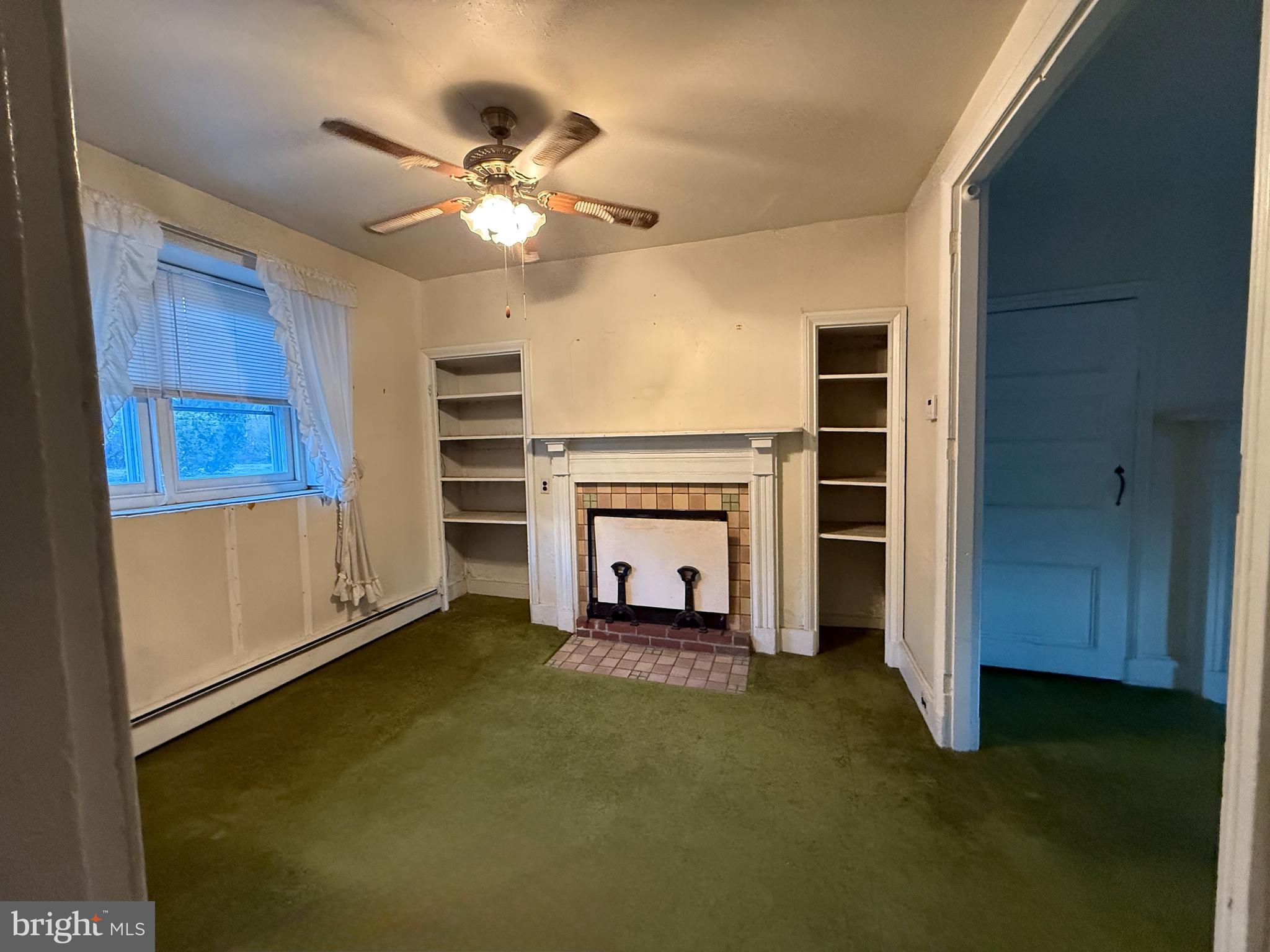 281 Matsonford Road Conshohocken, PA 19428 - Photo 11 of 16 wooden floor in ceiling room and window