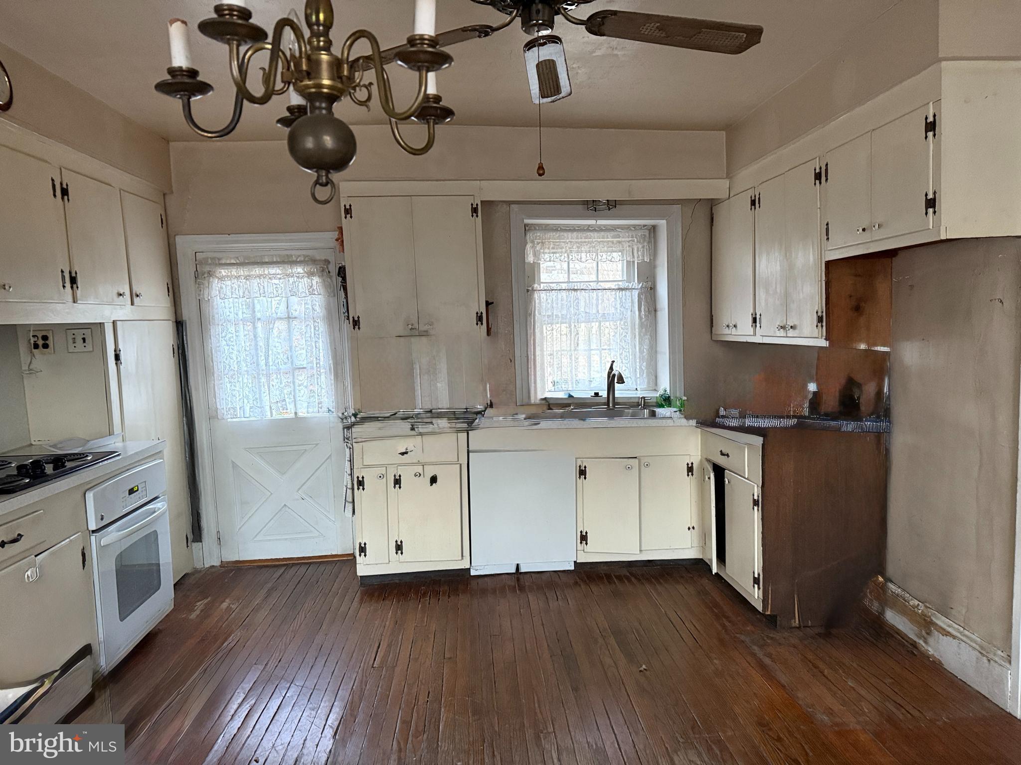 281 Matsonford Road Conshohocken, PA 19428 - Photo 13 of 16 a kitchen with cabinets wooden floor and a window