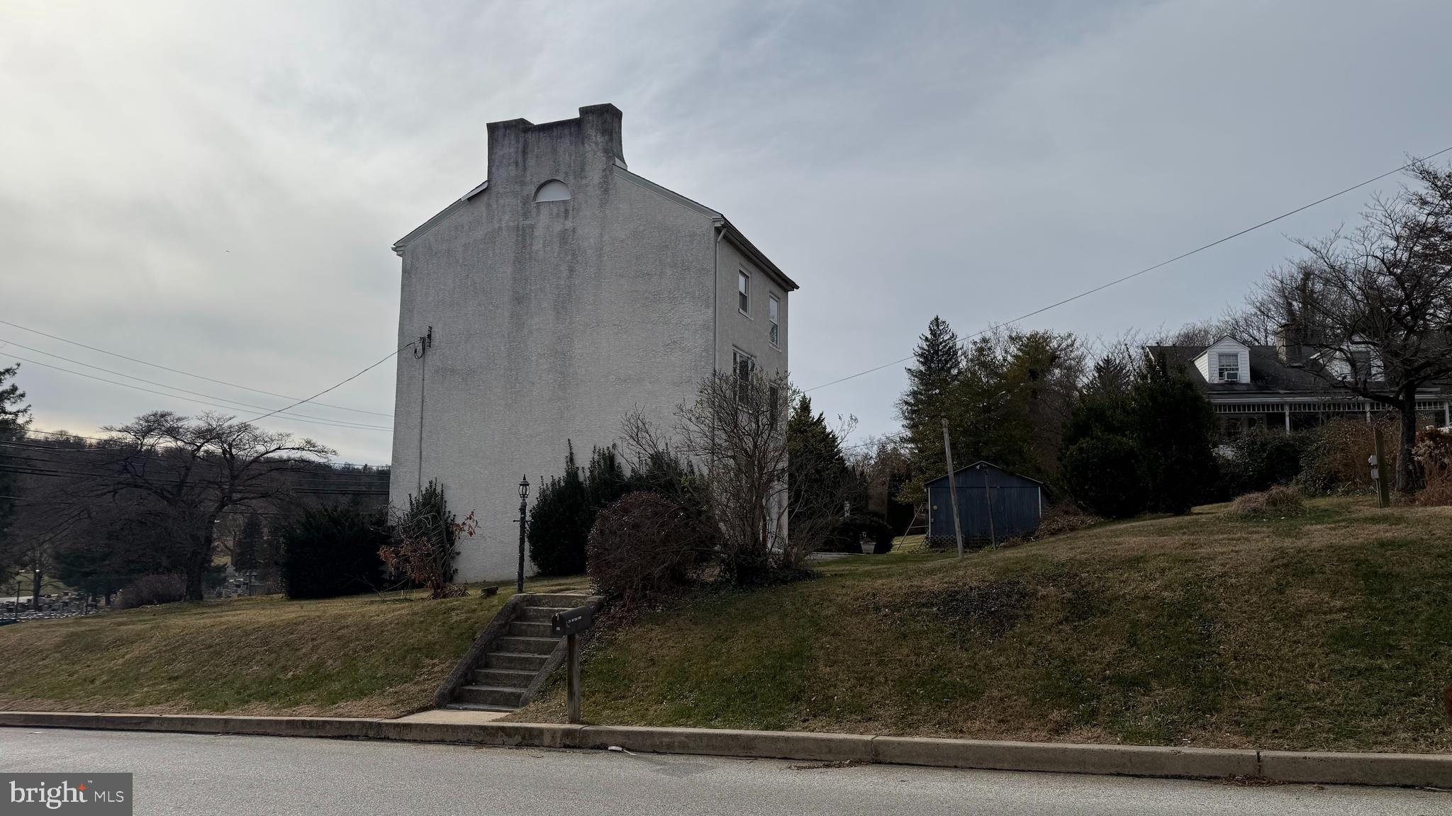 281 Matsonford Road Conshohocken, PA 19428 - Photo 5 of 16 a front view of a house with trees