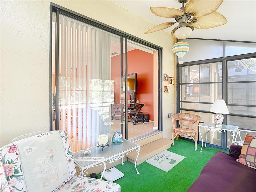 12924 Wedgewood Way, Unit D Hudson, FL 34667 - Photo 43 of 69 a living room filled with furniture and a table