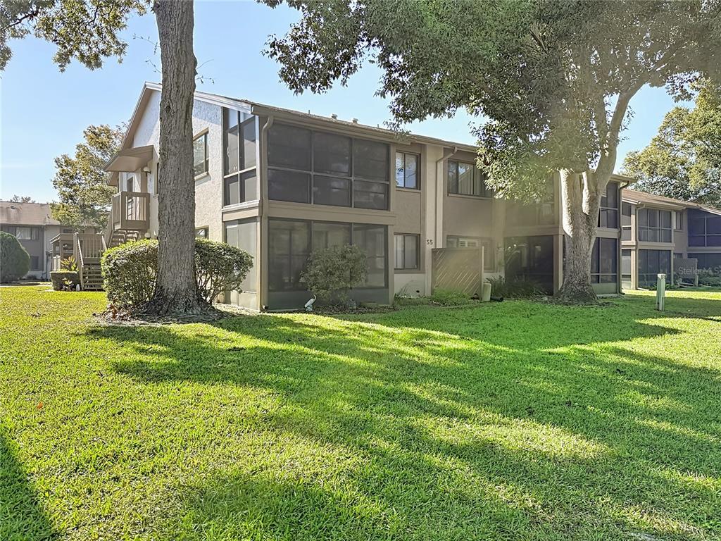 12924 Wedgewood Way, Unit D Hudson, FL 34667 - Photo 49 of 69 a view of a back yard