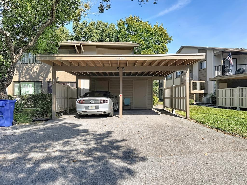 12924 Wedgewood Way, Unit D Hudson, FL 34667 - Photo 6 of 69 a car parked in front of house