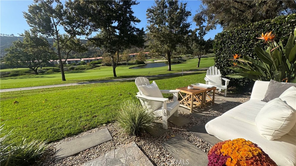 31421 East Nine Drive, Unit 79A Laguna Niguel, CA 92677 - Photo 3 of 31 a view of a two chairs in patio with a yard