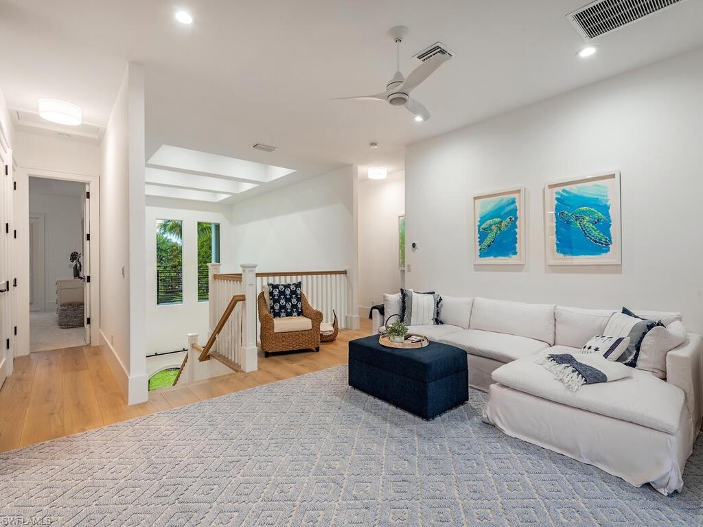 282 Bahia Point Naples, FL 34103 - Photo 28 of 38 a living room with furniture