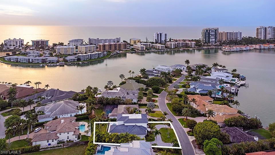 282 Bahia Point Naples, FL 34103 - Photo 37 of 38 a view of a city and ocean view