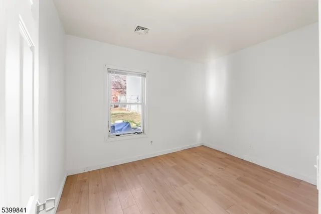 an empty room with window