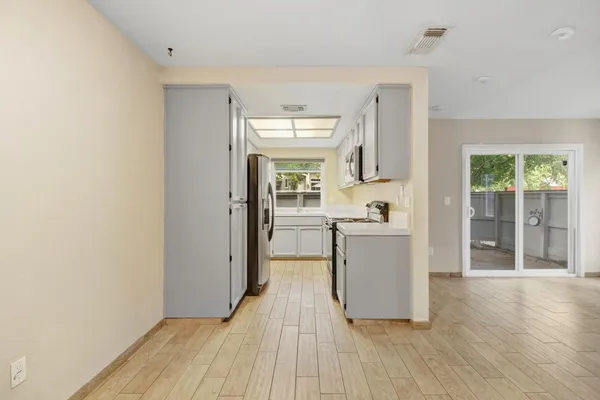 a room with a sink and a mirror