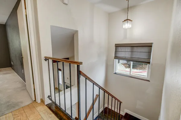 a view of entryway with wooden floor