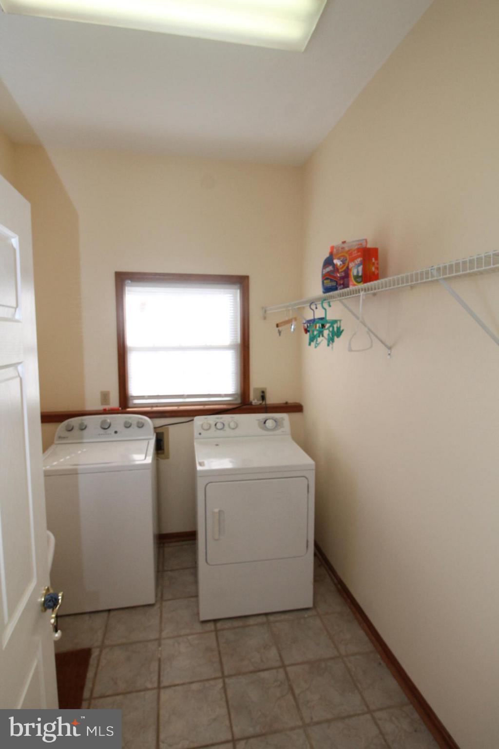 301 Huntersridge Road Winchester, VA 22602 - Photo 17 of 51 Laundry room with lots of room to hang clothes.