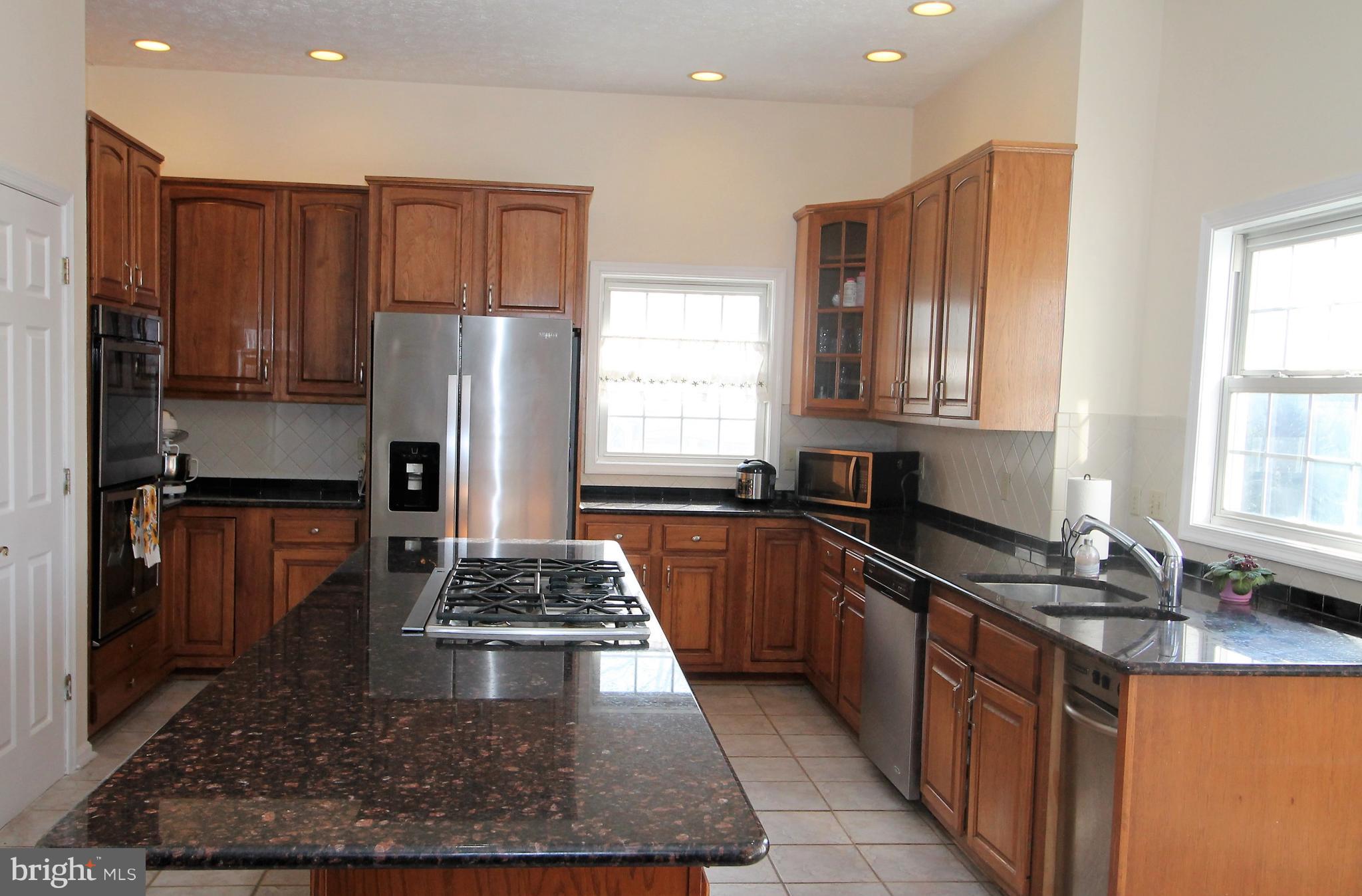 301 Huntersridge Road Winchester, VA 22602 - Photo 3 of 51 Granite counters & gas cooktop