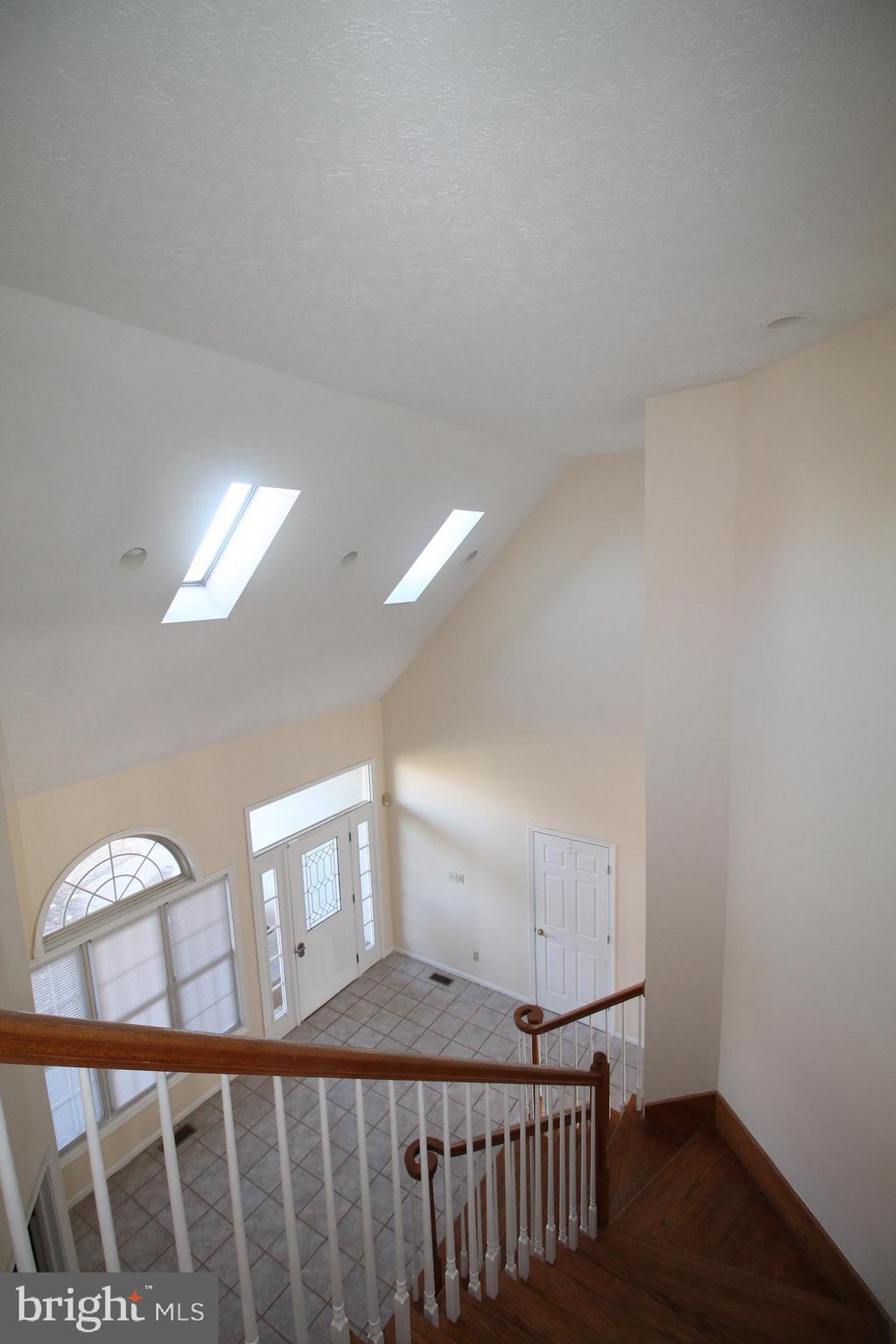 301 Huntersridge Road Winchester, VA 22602 - Photo 25 of 51 View of foyer from top of steps showing skylights.