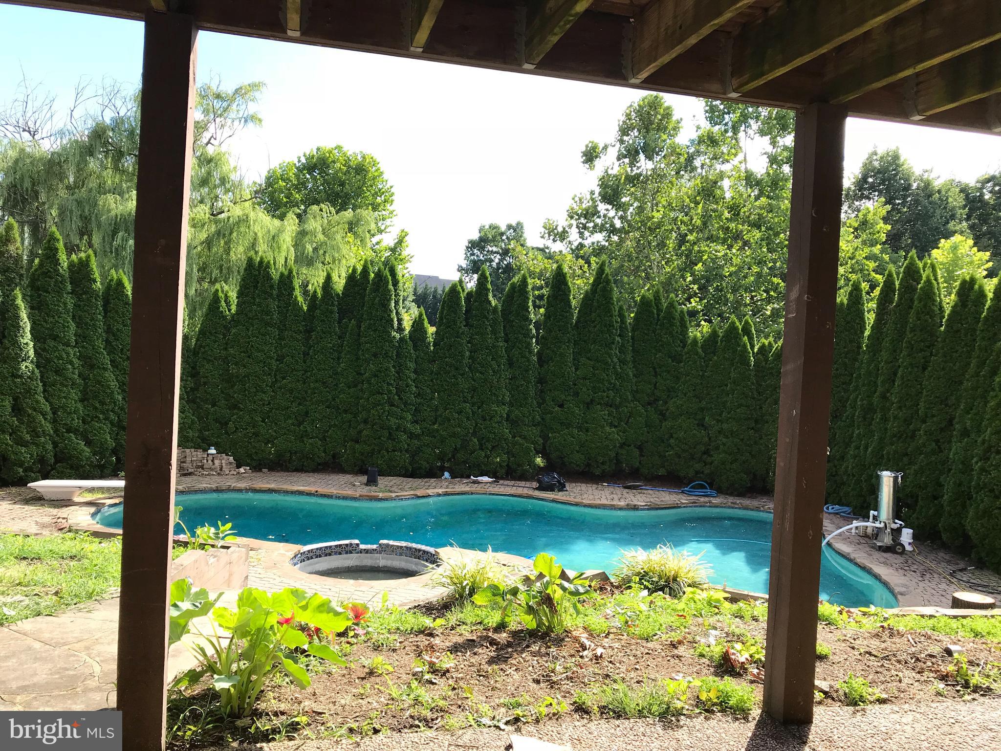 301 Huntersridge Road Winchester, VA 22602 - Photo 51 of 51 View of the pool from the basement level patio
