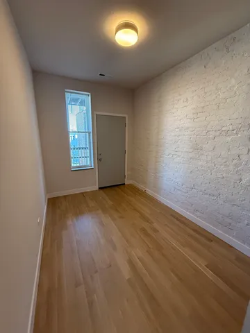 a view of an empty room and window