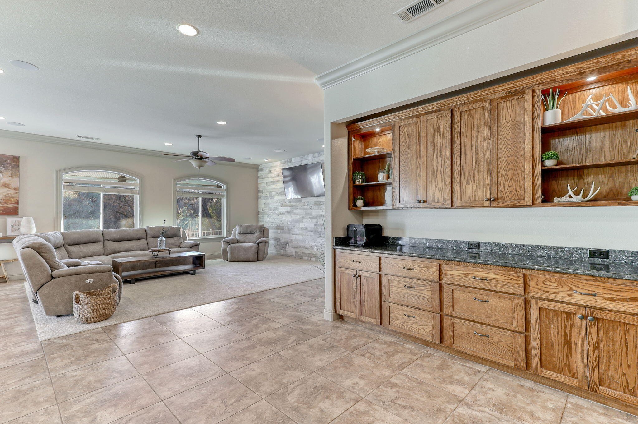 9271 Placer Road Redding, CA 96001 - Photo 15 of 45 a living room with furniture and a fireplace