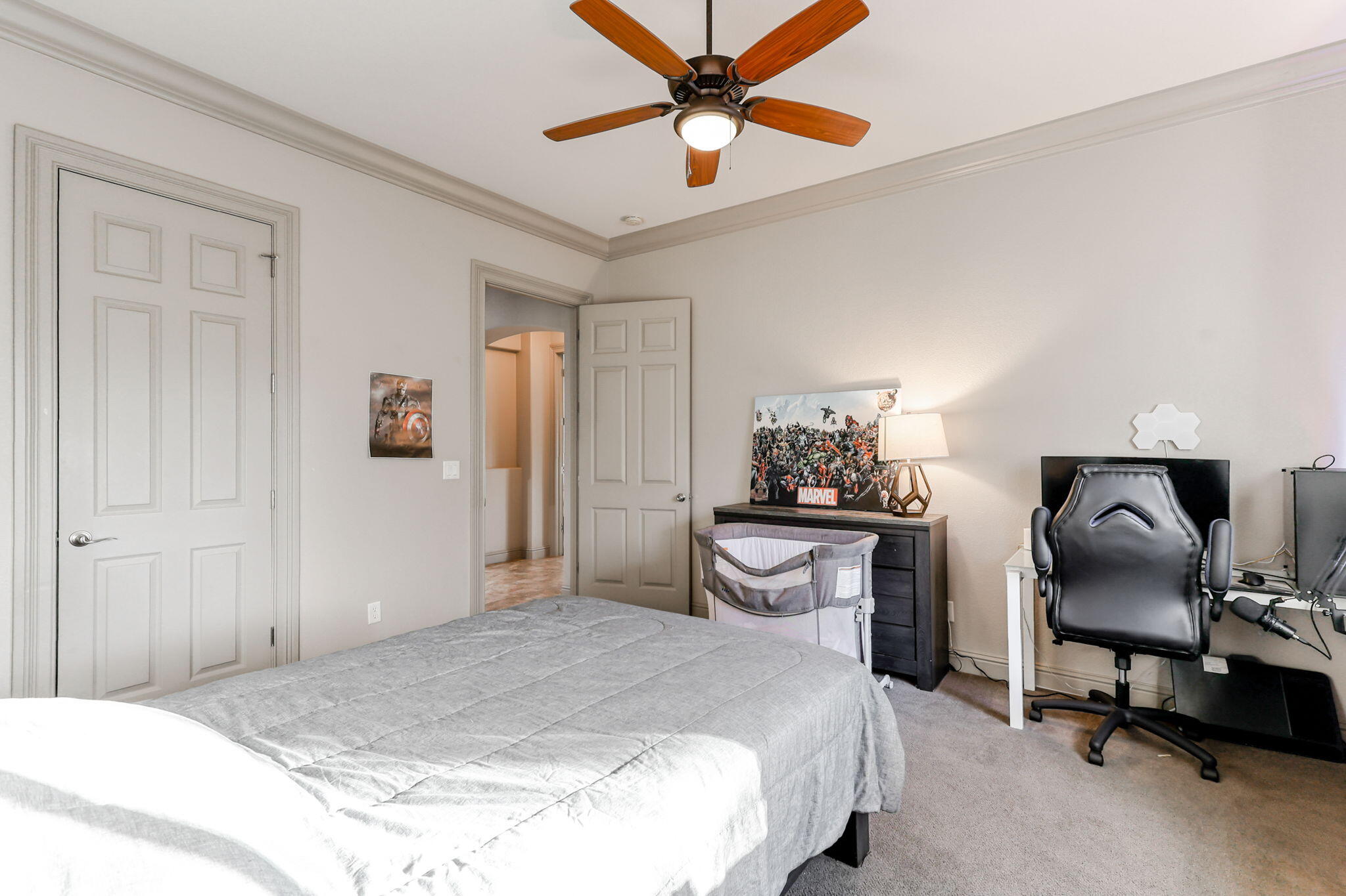 9271 Placer Road Redding, CA 96001 - Photo 21 of 45 a bedroom with a bed and a chair