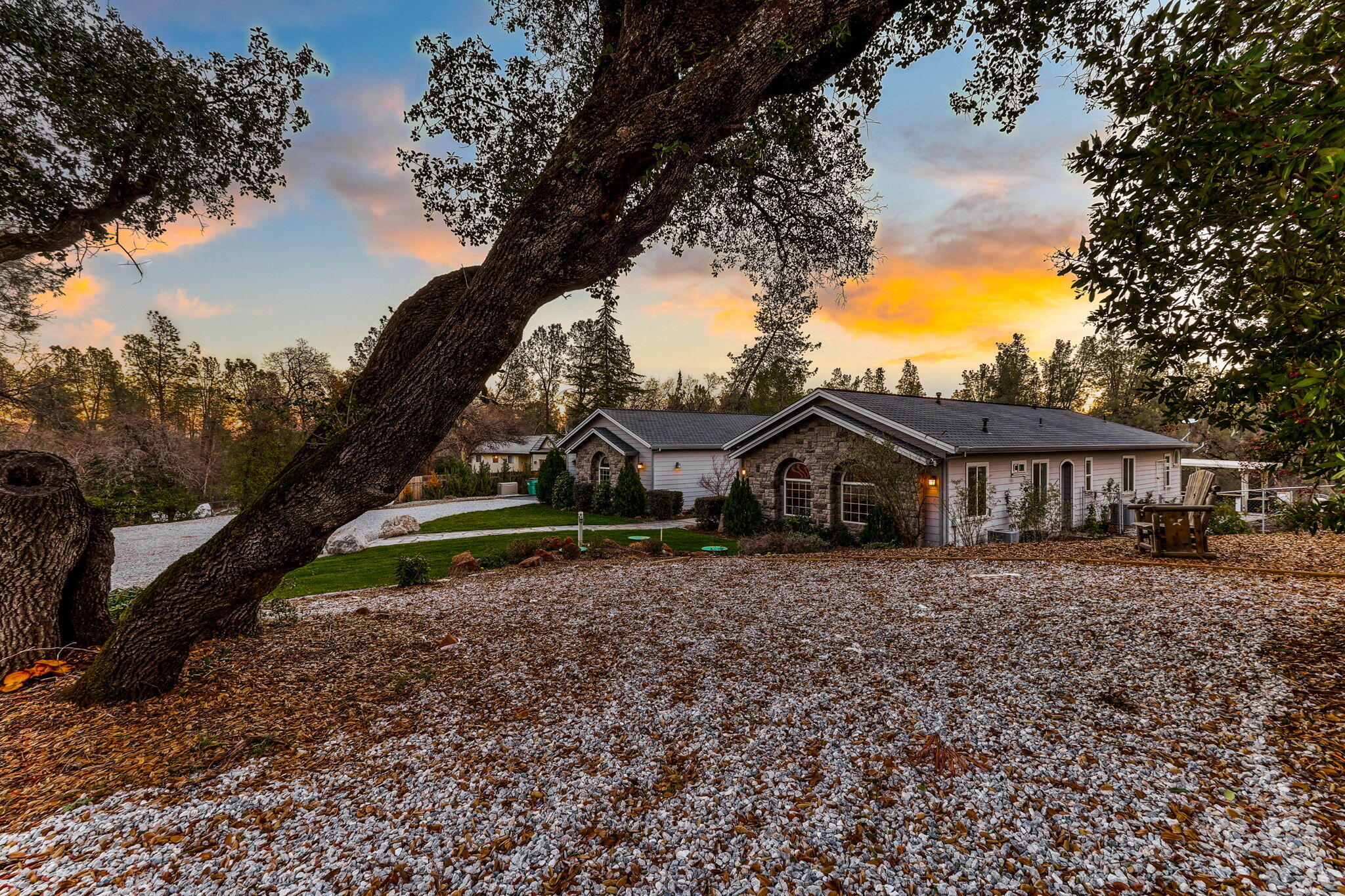 9271 Placer Road Redding, CA 96001 - Photo 3 of 45 a view of a house with a yard