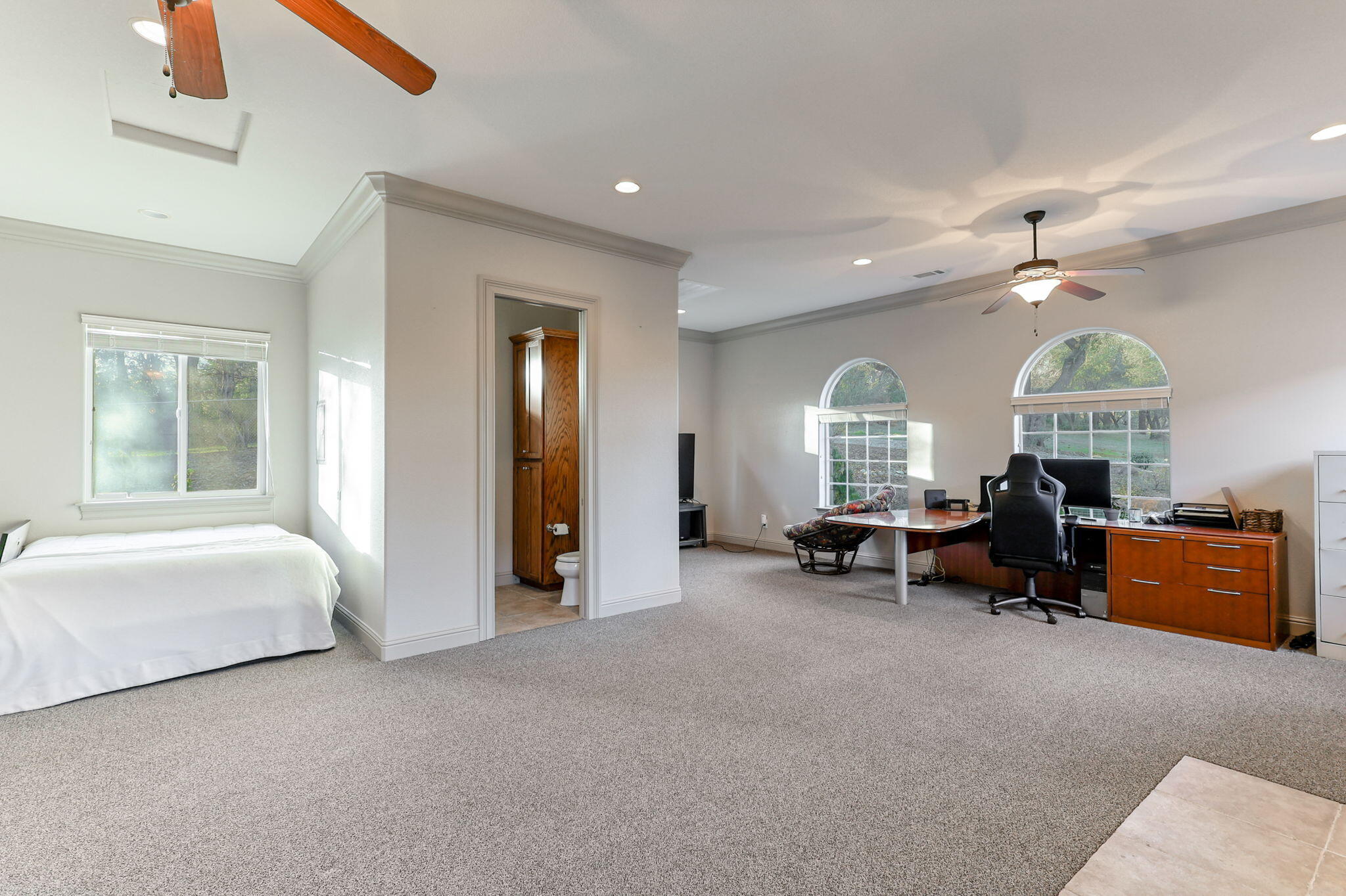 9271 Placer Road Redding, CA 96001 - Photo 31 of 45 a living room with furniture and a chandelier