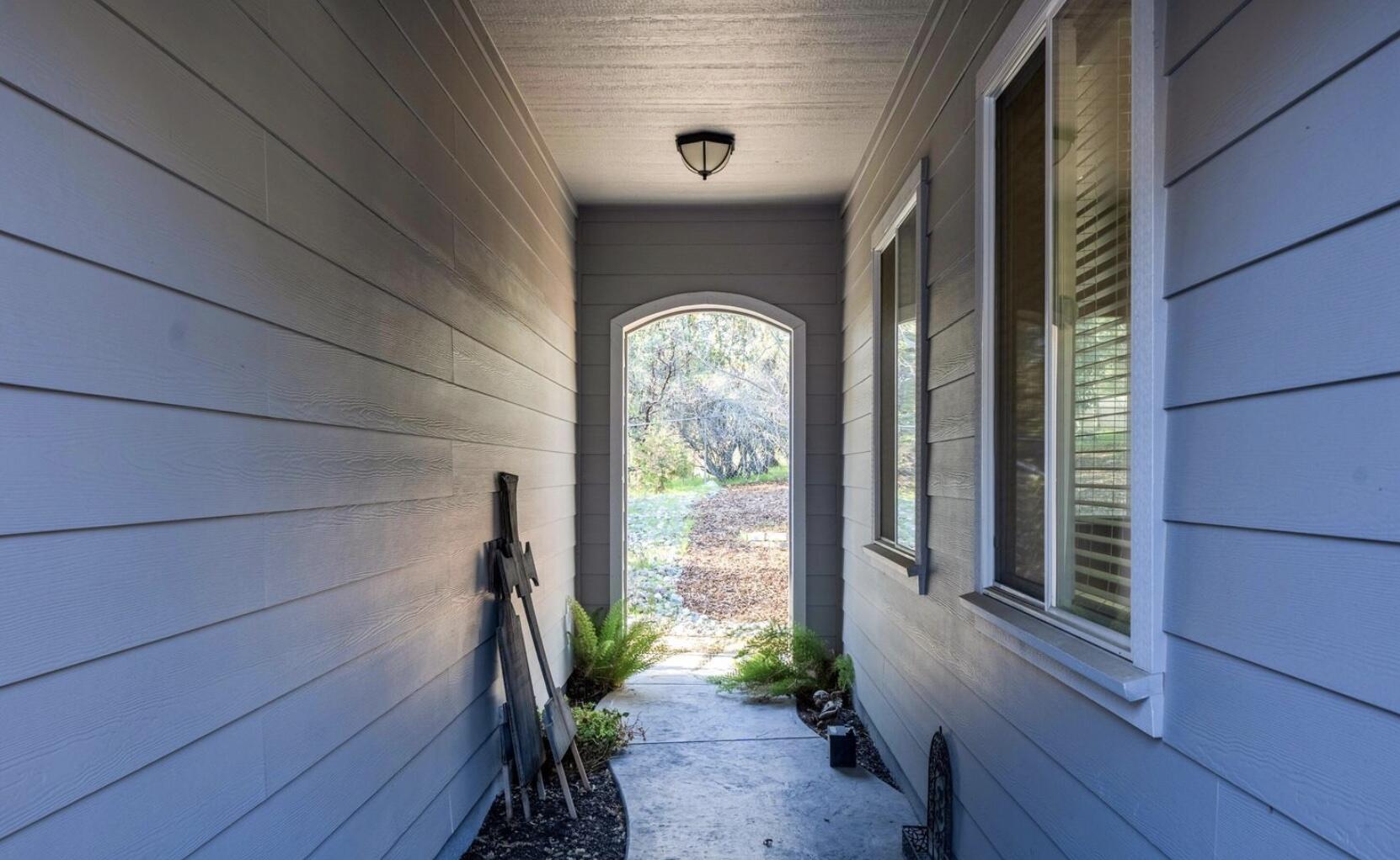 9271 Placer Road Redding, CA 96001 - Photo 32 of 45 a view of a porch with furniture