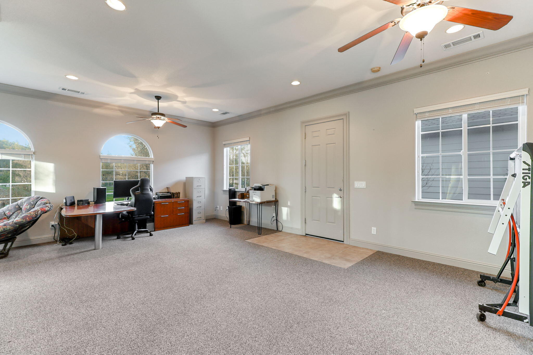 9271 Placer Road Redding, CA 96001 - Photo 33 of 45 a living room with furniture and a chandelier