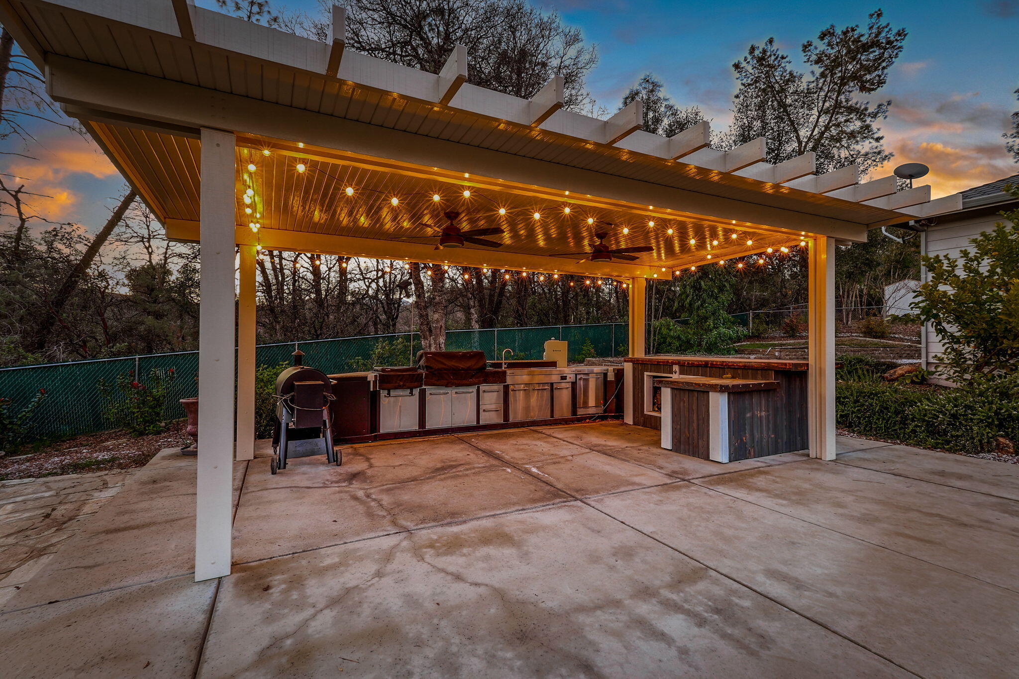 9271 Placer Road Redding, CA 96001 - Photo 39 of 45 a view of a swimming pool with a patio