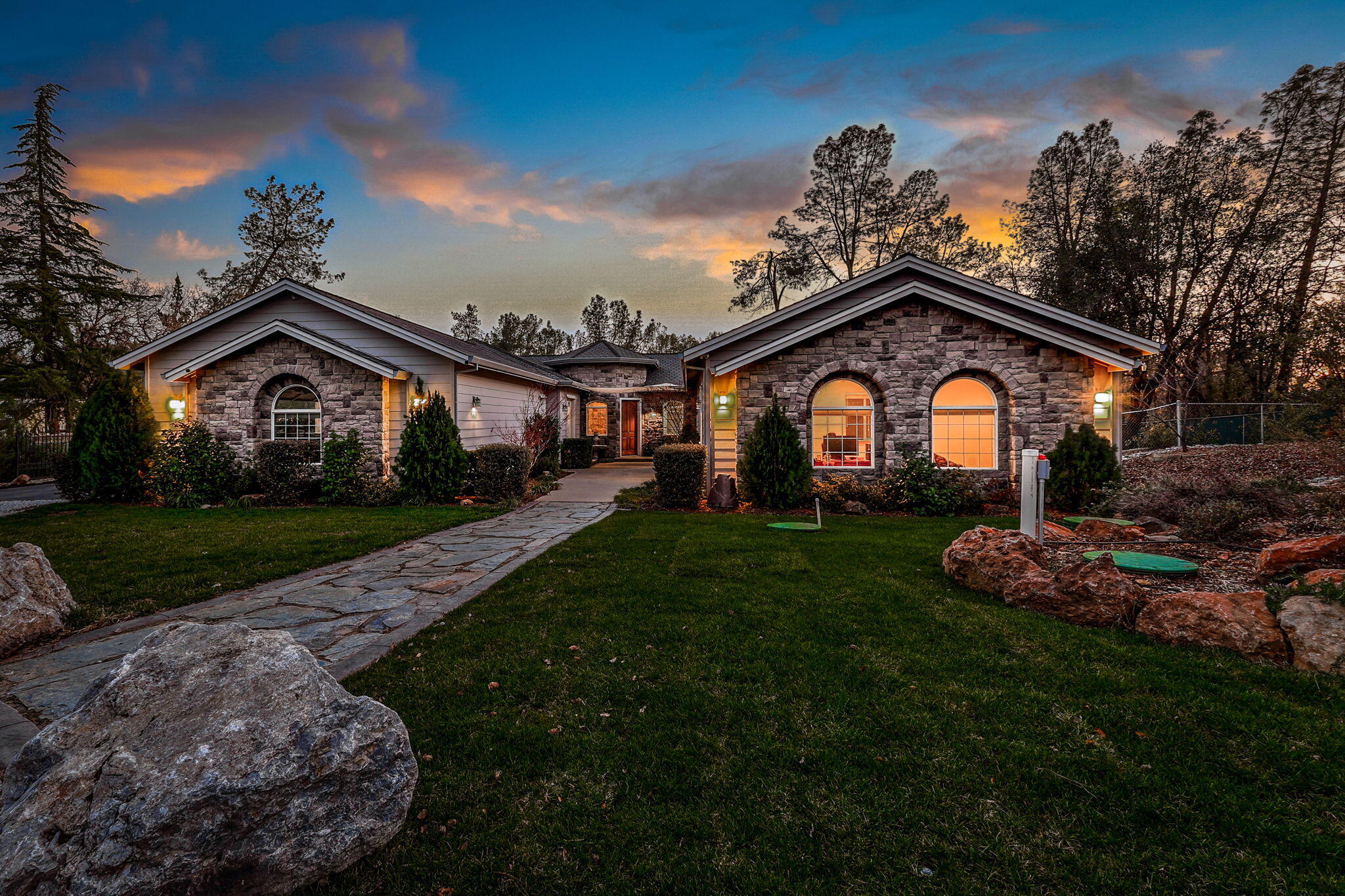 9271 Placer Road Redding, CA 96001 - Photo 43 of 45 a front view of a house with garden