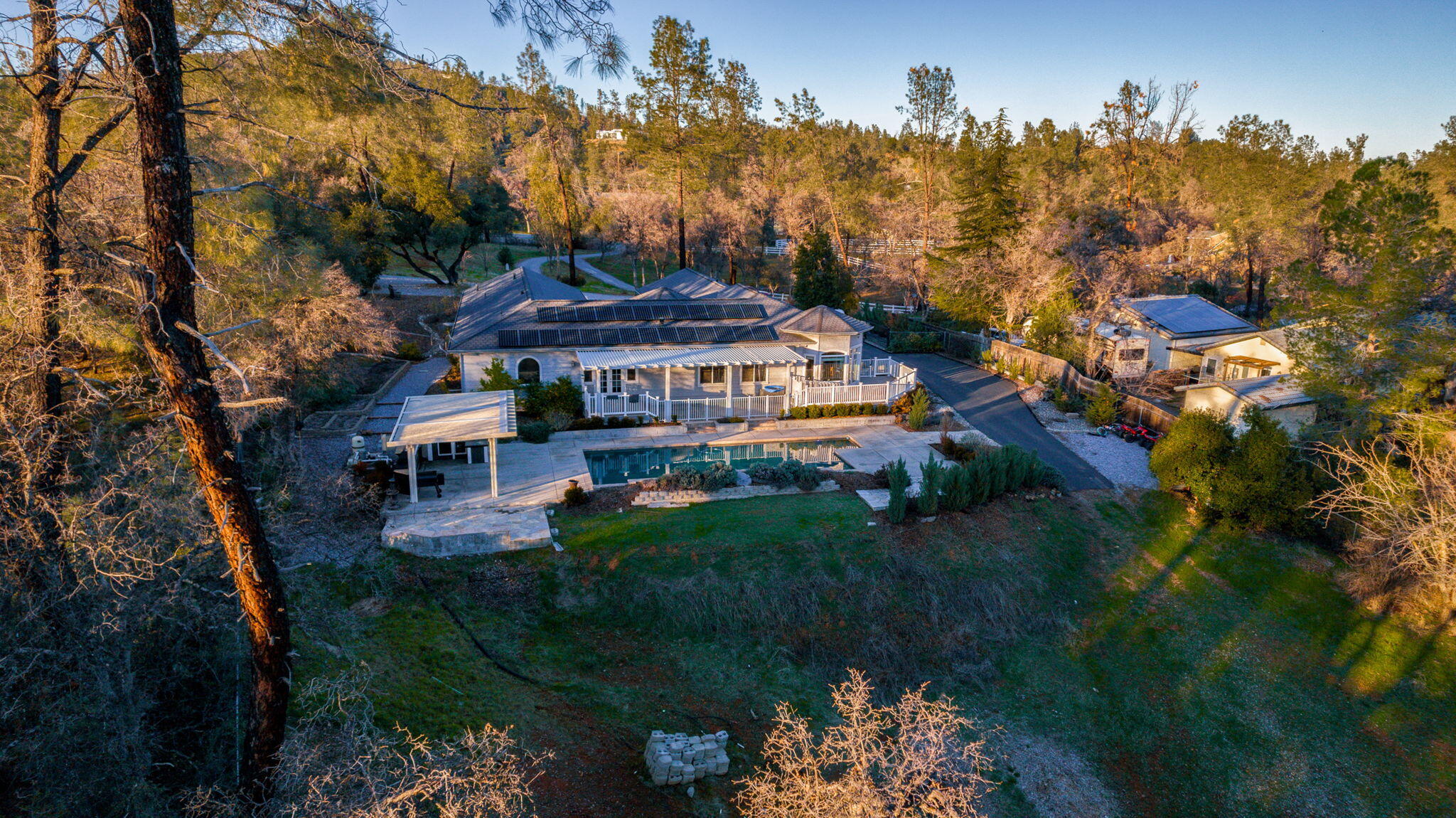 9271 Placer Road Redding, CA 96001 - Photo 44 of 45 a view of a house with garden and a sitting area