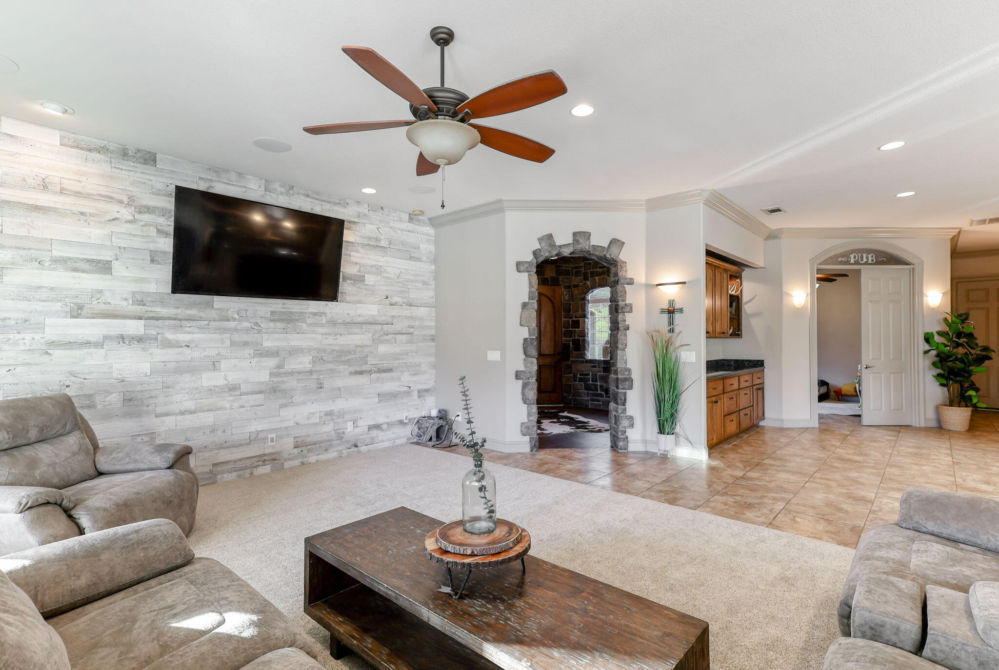 9271 Placer Road Redding, CA 96001 - Photo 7 of 45 a living room with furniture and a flat screen tv