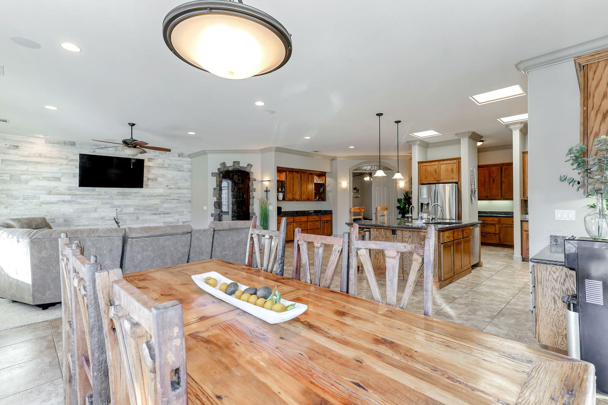 9271 Placer Road Redding, CA 96001 - Photo 9 of 45 a large kitchen with a table and chairs