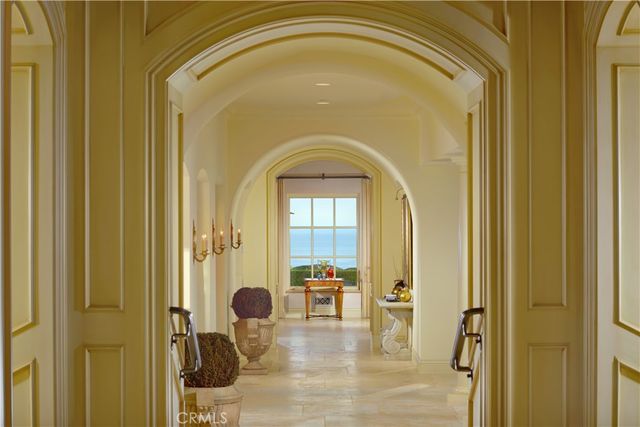 a dining area with granite countertop kitchen island stainless steel appliances a table and chairs