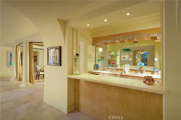 a kitchen with stainless steel appliances granite countertop a sink and cabinets