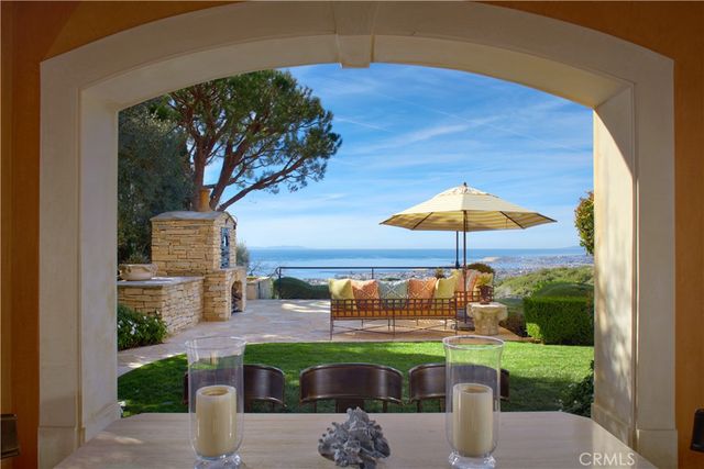 a view of a building with sitting area