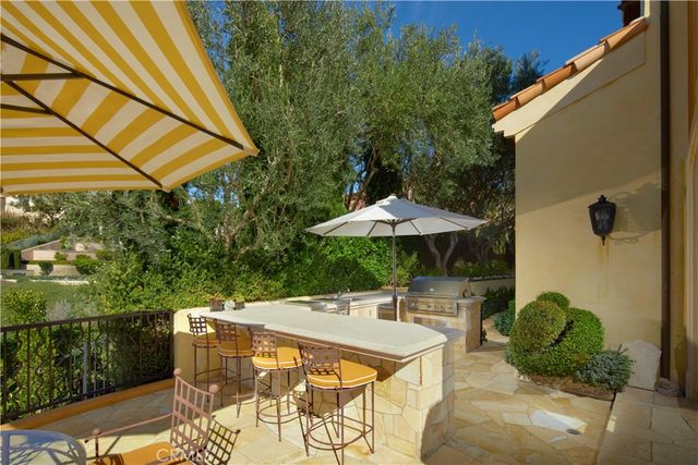 a living room with furniture stove and a table