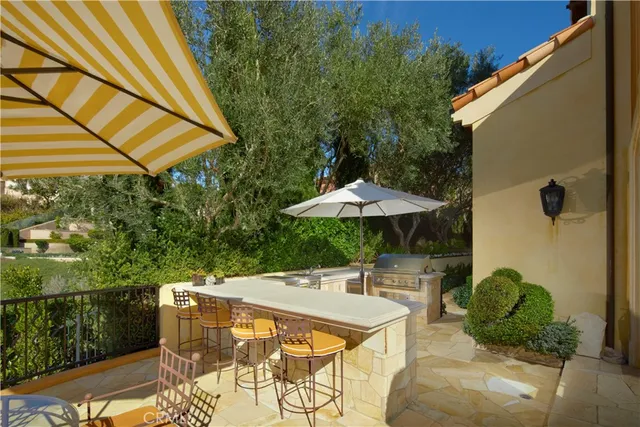 a living room with furniture stove and a table